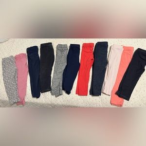 11 pairs of girls 2T leggings. All various brands. GUC but plenty of life left!!